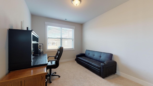 home office with light carpet