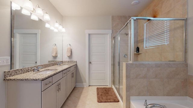 bathroom featuring vanity, tile patterned flooring, and independent shower and bath