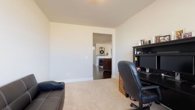 home office with carpet flooring