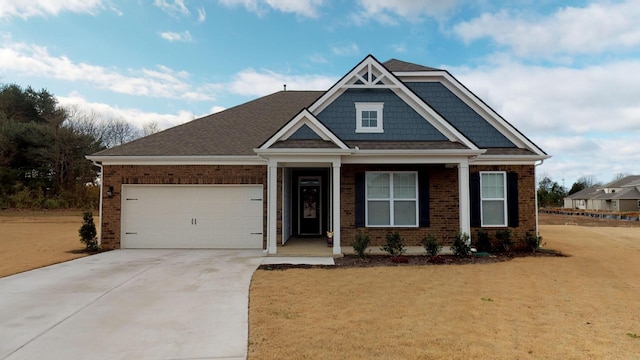 craftsman-style house with a garage and a front yard