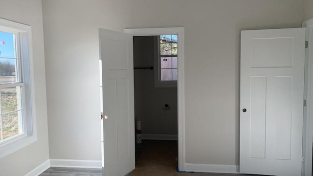 unfurnished bedroom with baseboards