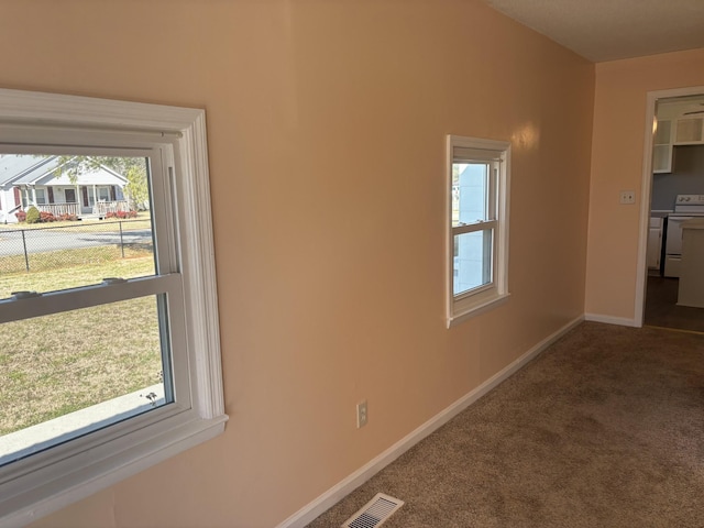 spare room with carpet flooring