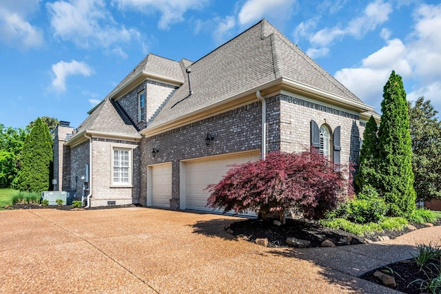 view of home's exterior with a garage