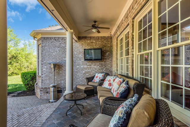 view of patio featuring ceiling fan and an outdoor hangout area