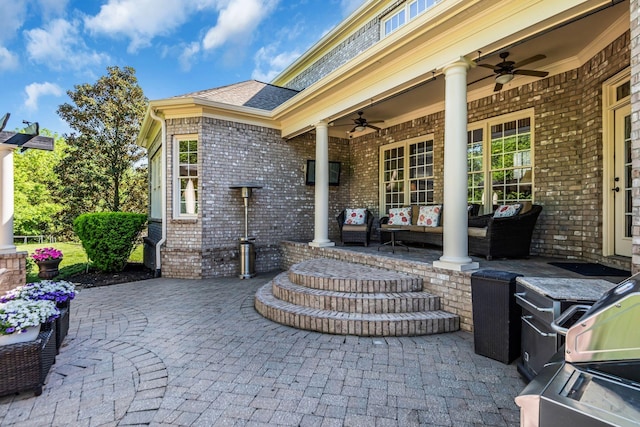 view of patio / terrace with ceiling fan and an outdoor hangout area