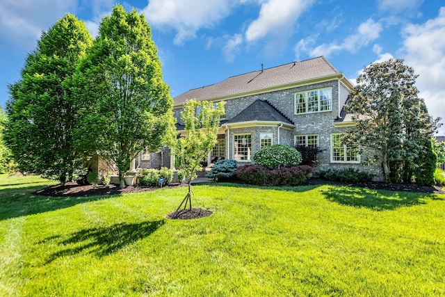 view of front of house with a front yard