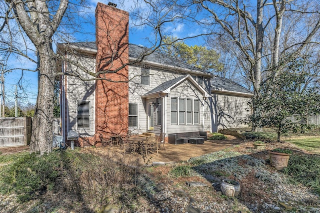 rear view of house with a patio