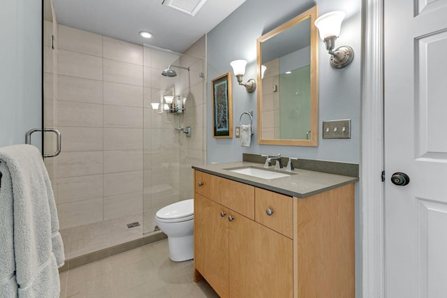 bathroom with vanity, toilet, an enclosed shower, and tile patterned flooring