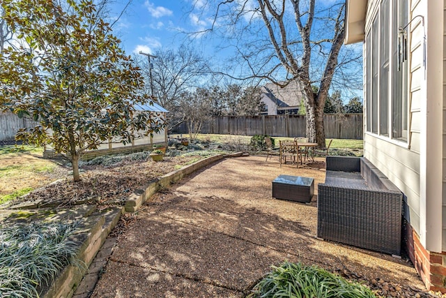 view of yard with outdoor lounge area and a patio