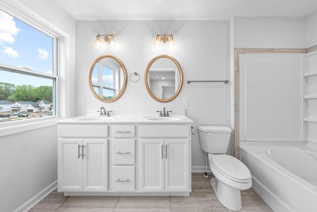 full bathroom featuring vanity, shower / bathtub combination, and toilet