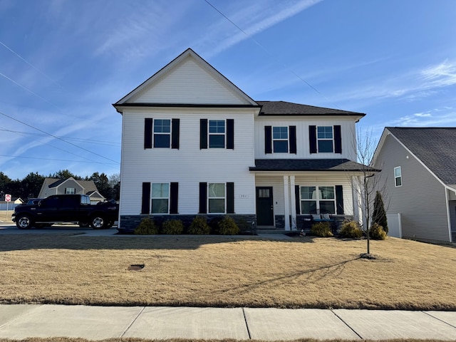 view of front of property with a front yard