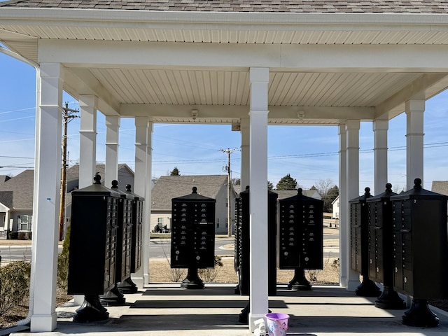 view of home's community featuring mail boxes