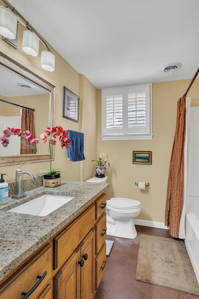 full bathroom featuring vanity, toilet, and shower / bath combo with shower curtain