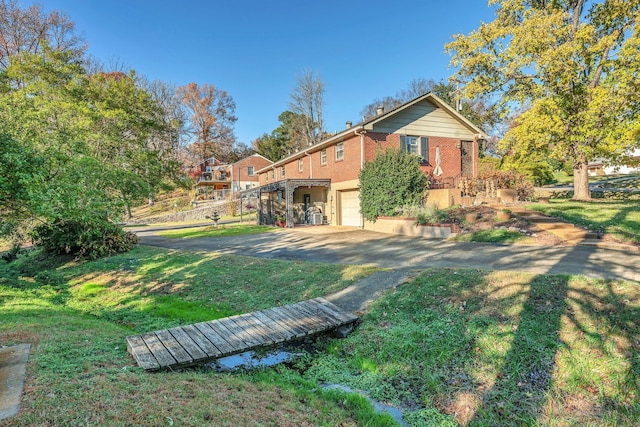 view of yard with a garage