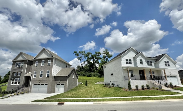 view of front of house with a garage, covered porch, and a front lawn