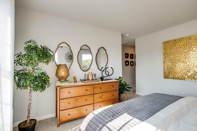 bedroom with light colored carpet