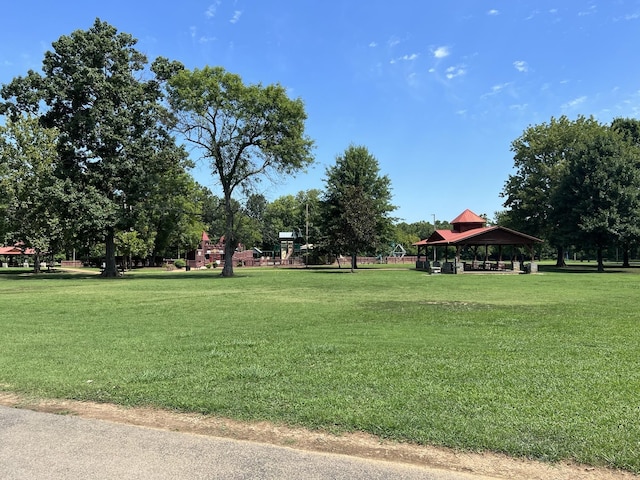 view of community with a gazebo and a lawn