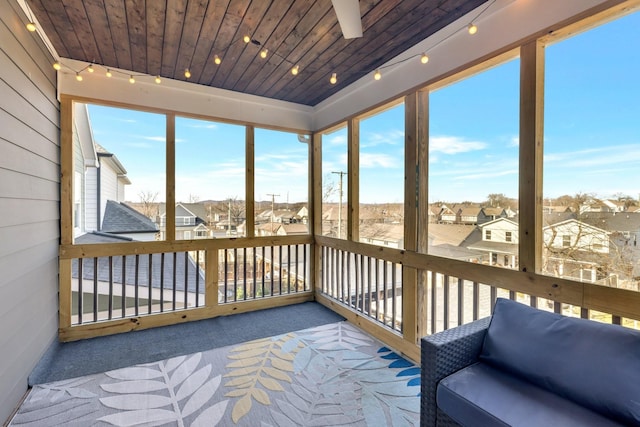 sunroom with wooden ceiling