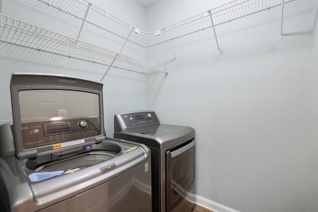 laundry area featuring washing machine and dryer