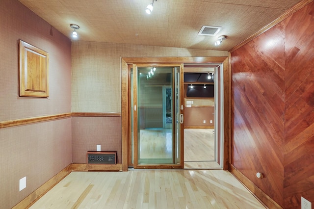 spare room with light wood-type flooring