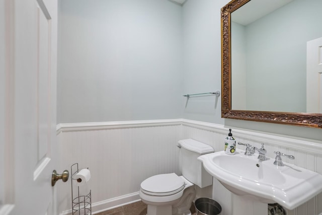 bathroom with sink and toilet