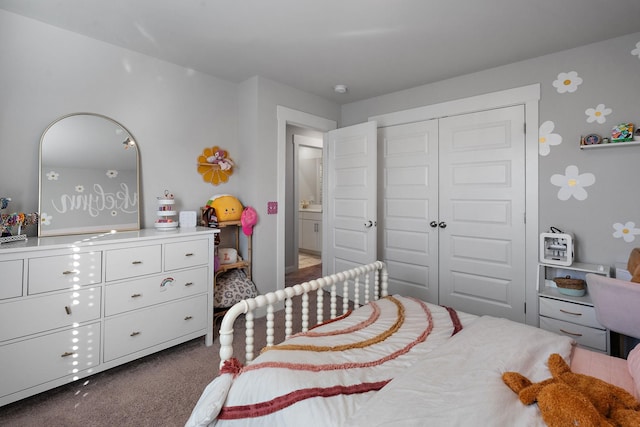 bedroom with a closet and carpet