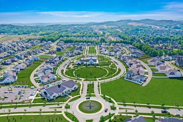 birds eye view of property with a mountain view