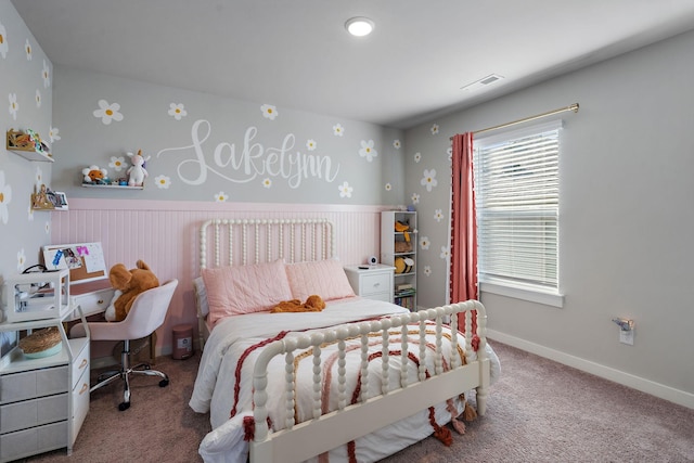 bedroom with carpet, visible vents, and baseboards