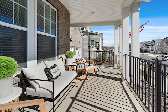 balcony featuring a residential view