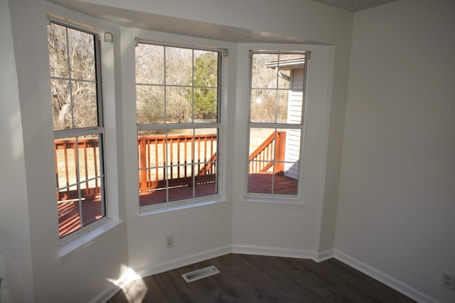 interior space with dark hardwood / wood-style floors