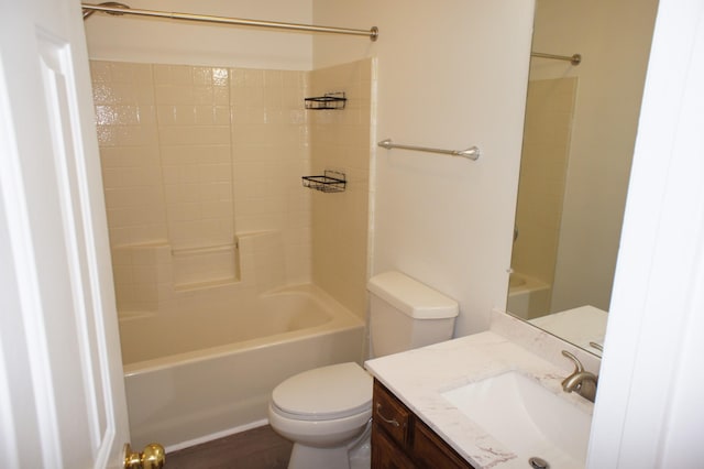 full bathroom featuring bathing tub / shower combination, vanity, and toilet