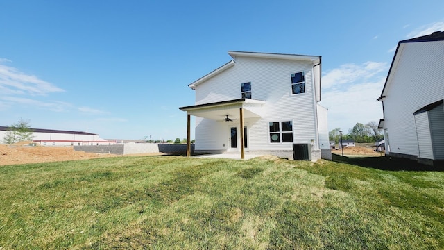 rear view of house with a lawn, a patio, ceiling fan, and central air condition unit