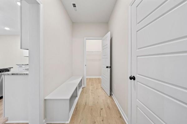 mudroom with light wood-type flooring