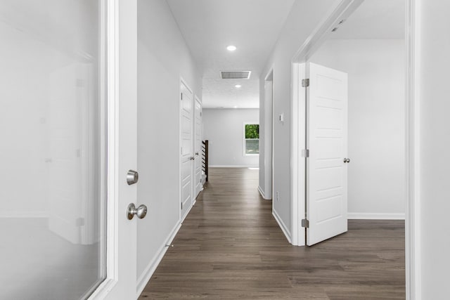 hall featuring dark hardwood / wood-style floors