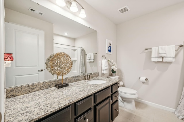 bathroom featuring tile patterned flooring, vanity, a shower with curtain, and toilet