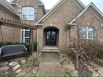 view of exterior entry with french doors