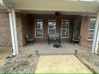 view of patio with ceiling fan