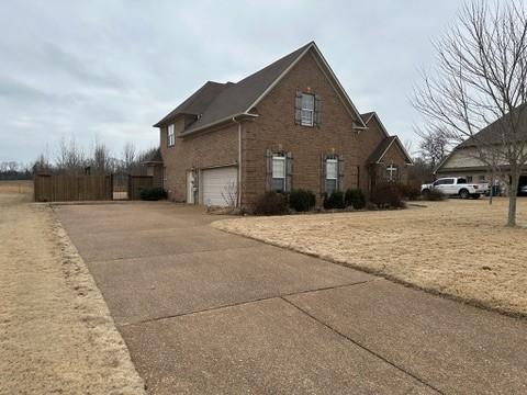 view of property exterior featuring a garage