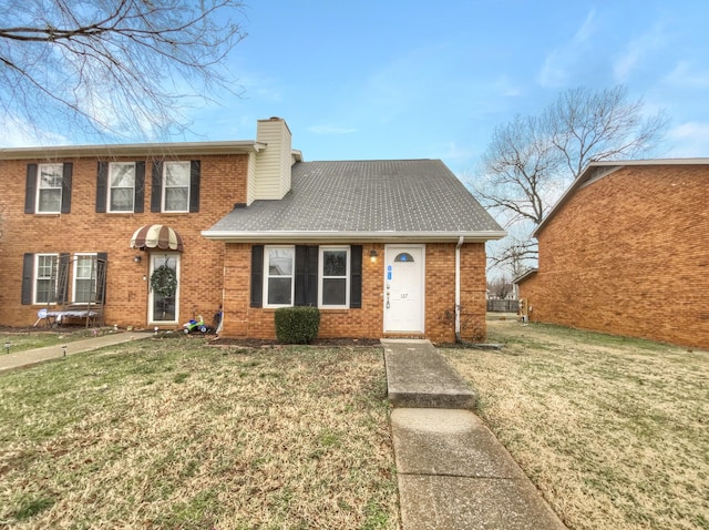 view of front facade featuring a front yard