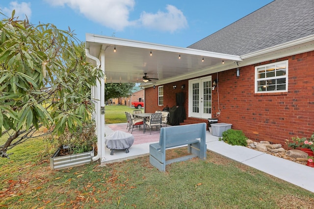 view of patio with ceiling fan and french doors