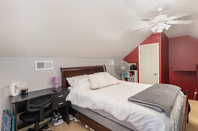 carpeted bedroom with lofted ceiling and ceiling fan