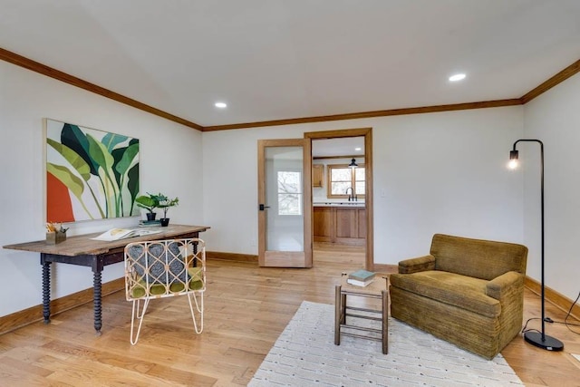 office featuring light hardwood / wood-style flooring and ornamental molding