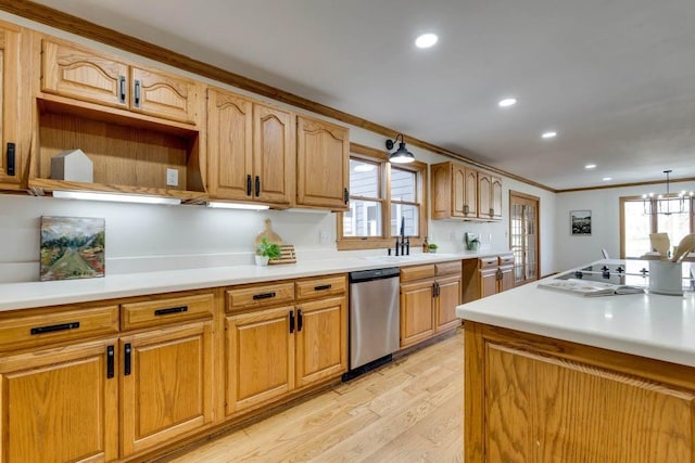 kitchen featuring a healthy amount of sunlight, stainless steel dishwasher, black electric stovetop, and ornamental molding