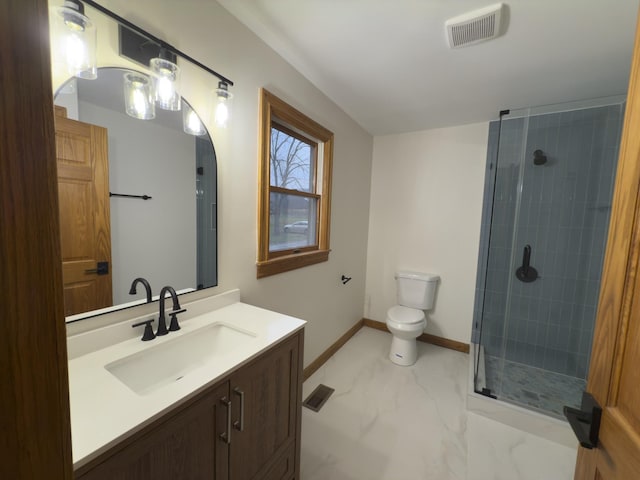 bathroom with walk in shower, vanity, and toilet