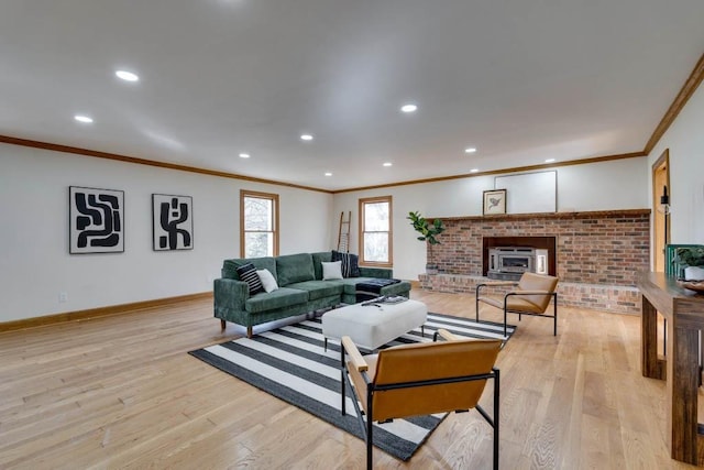 living room featuring crown molding and light wood-type flooring