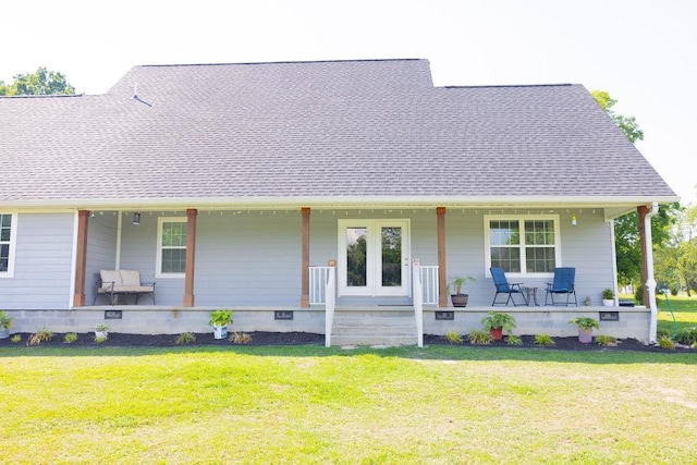 view of front of house featuring a porch and a front lawn