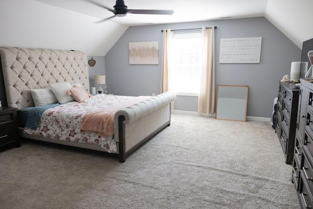 carpeted bedroom with lofted ceiling and ceiling fan