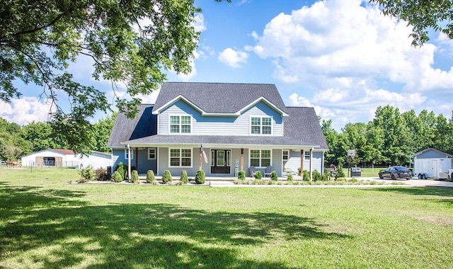 view of front of home featuring a front lawn and a porch