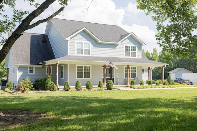 view of front of property with a porch and a front lawn