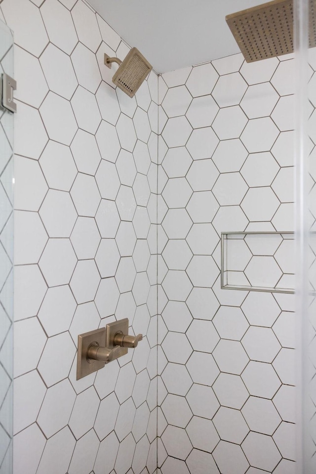 room details with a tile shower